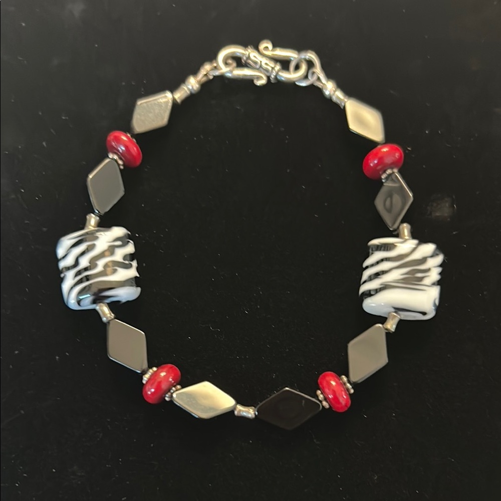 Black and White Beaded Bracelet with Red Accents